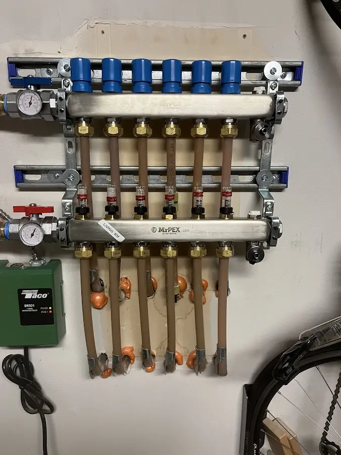 Plumber performing Water Heater Repair at a residential property in Richmond Hill